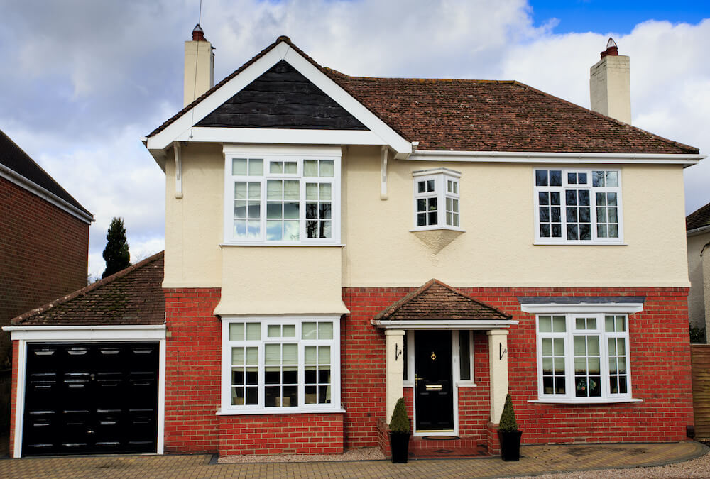 external shot of house with casement windows and bay casement windows