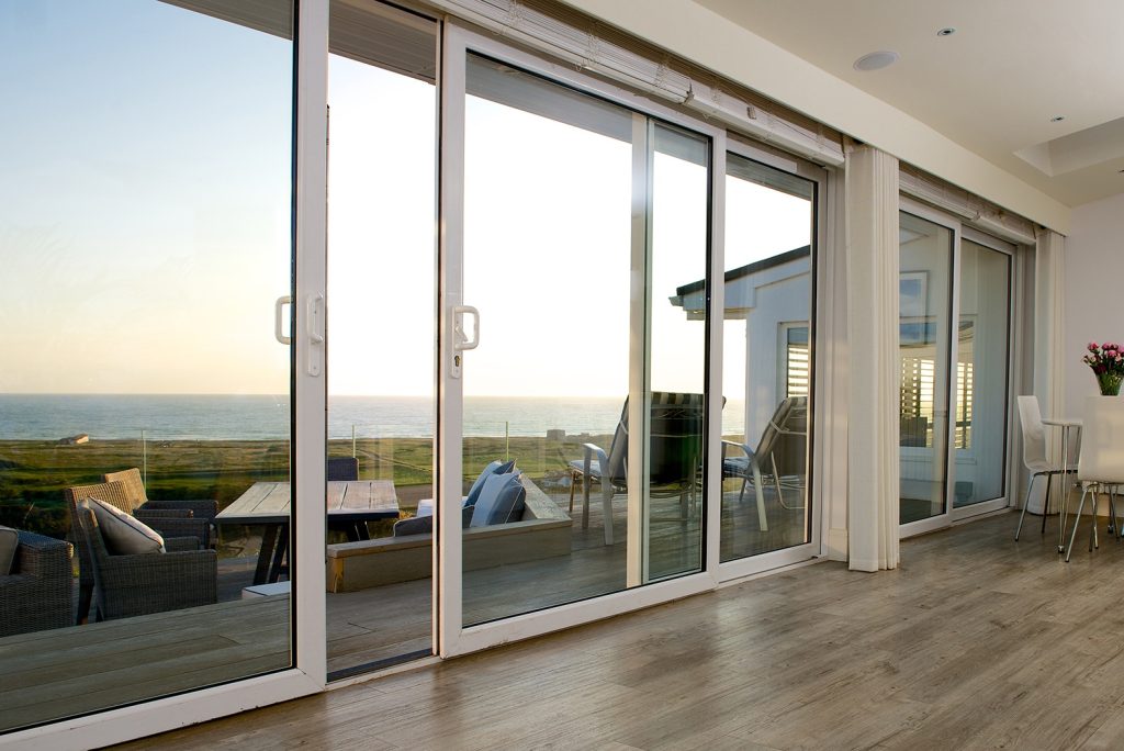 Angled image of white uPVC sliding doors